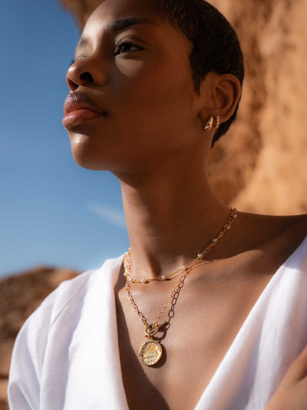 sun necklace gold