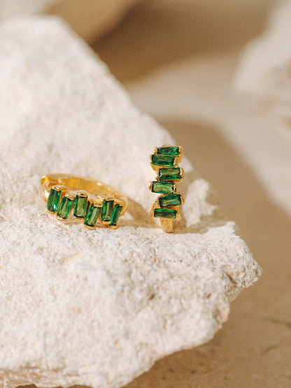 emerald block huggies on textured rock