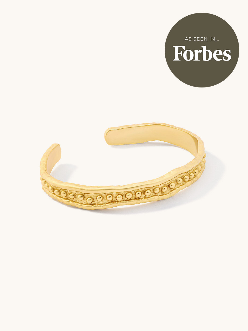 gold textured cuff as seen in forbes