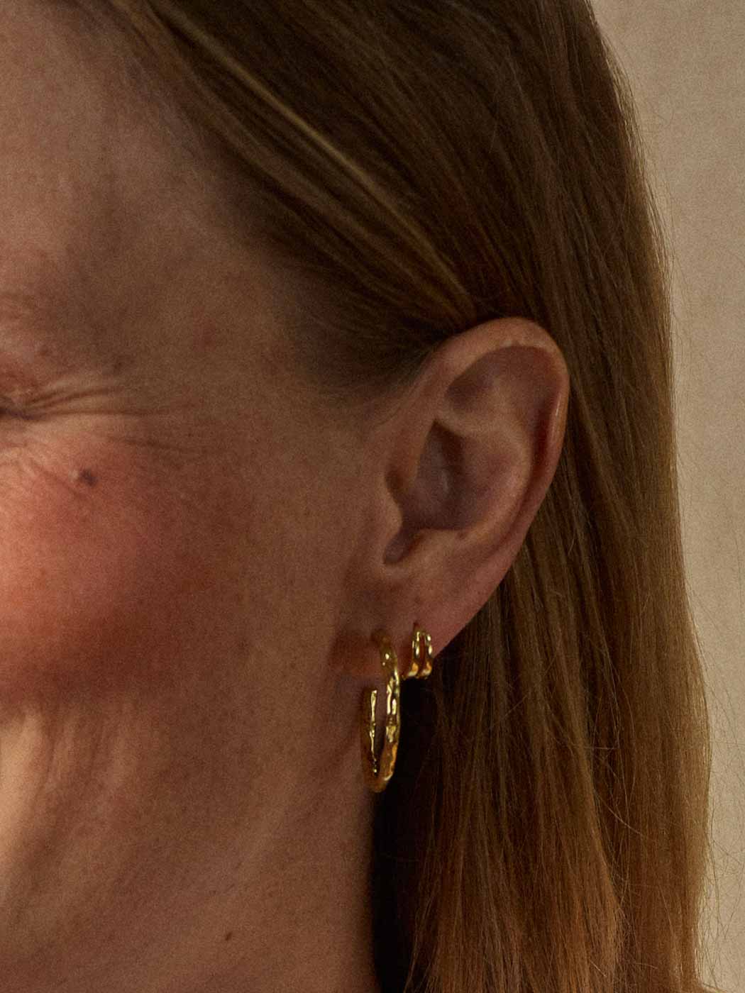 dainty multi row clicker huggie paired with a set on ear