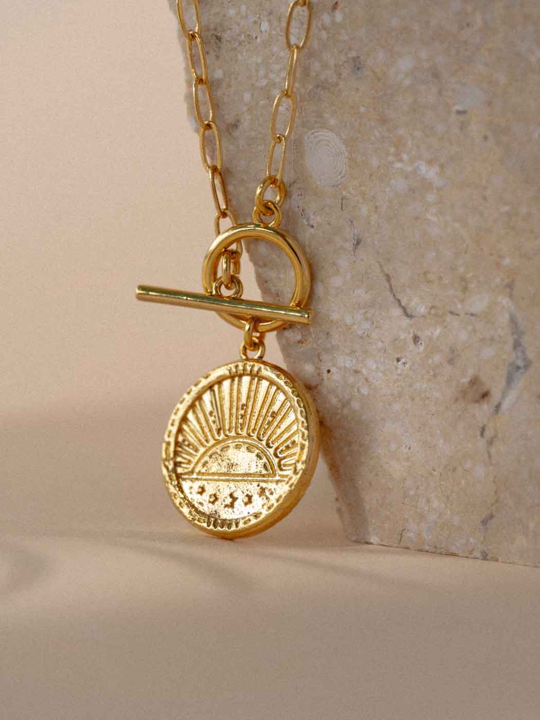 gold rising sun pendant necklace