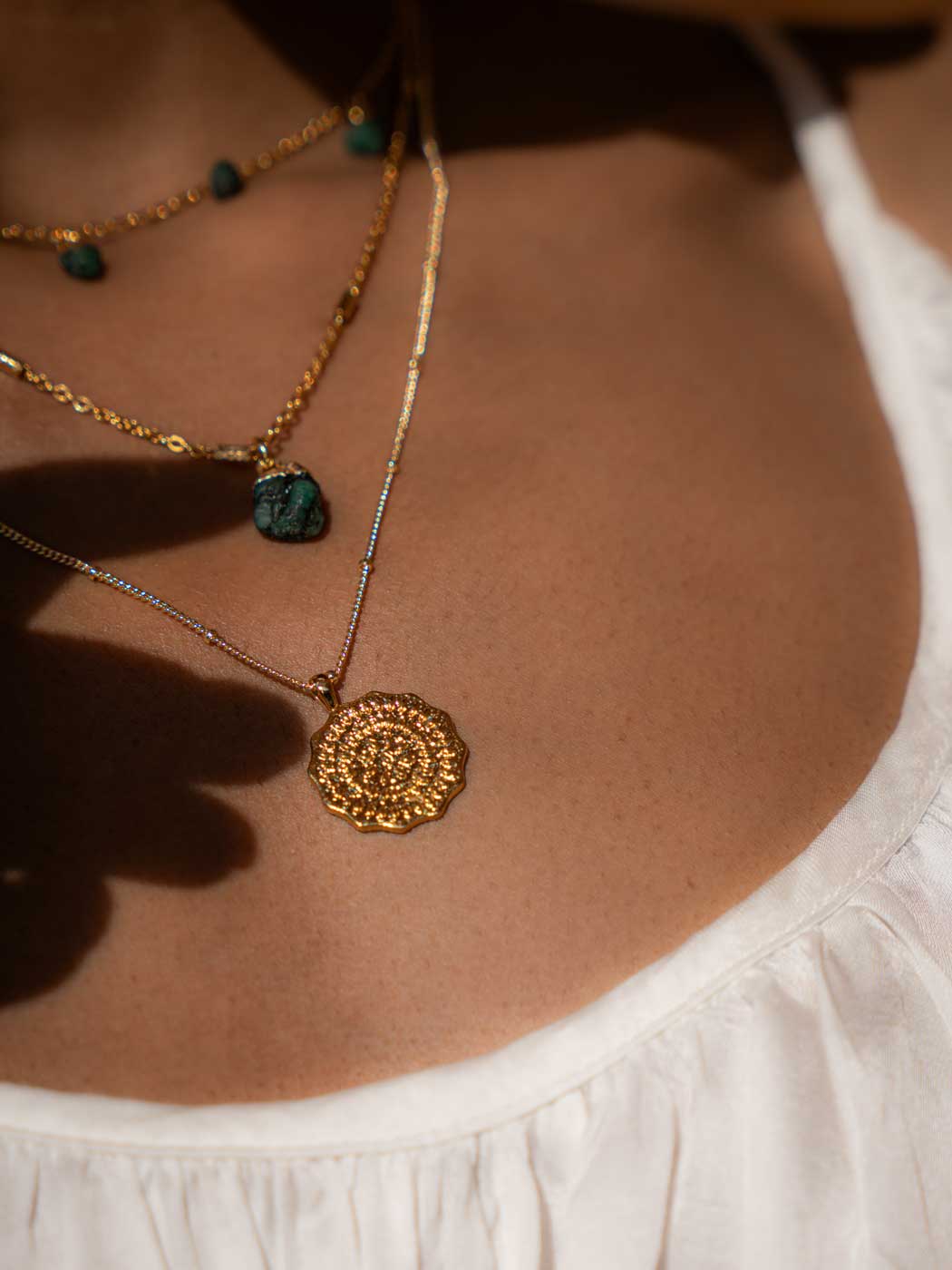 minimal hand carved gold necklace