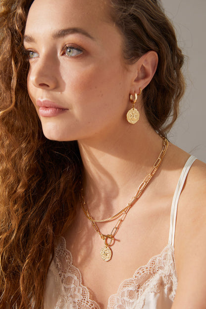     celestial-galaxy-statement-gold-hoops