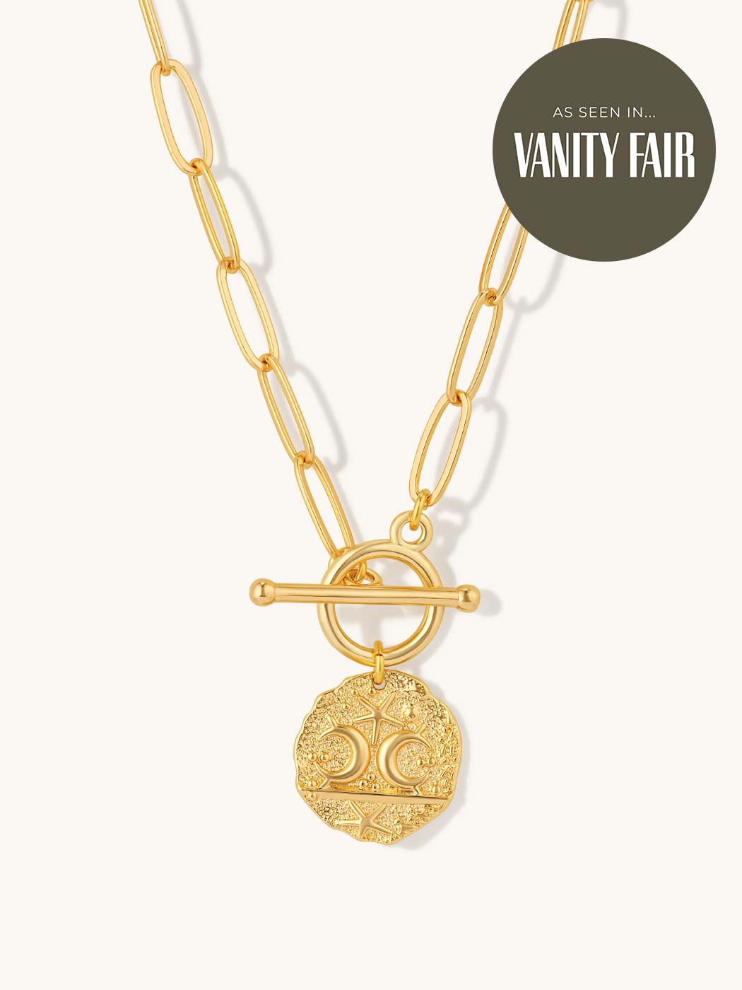 gold t bar necklace with celestial pendant