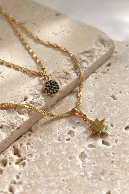 multi gold delicate chain with cubic zirconia celestial pendant